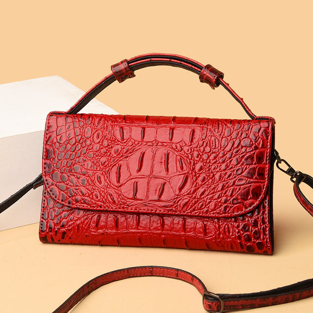 Golden Silhouette: Croc-Embossed Leather Messenger Bag