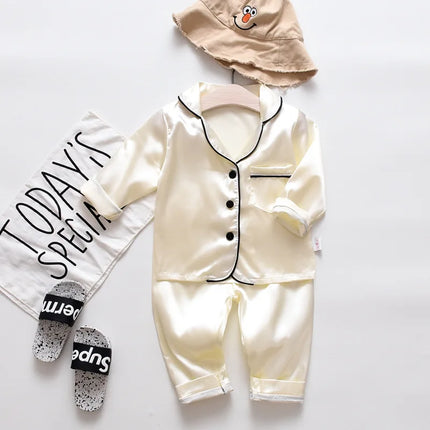 Korean version of childrens pajamas set silk satin long sleeve top+trousers two -piece male baby girl cartoon solid color set