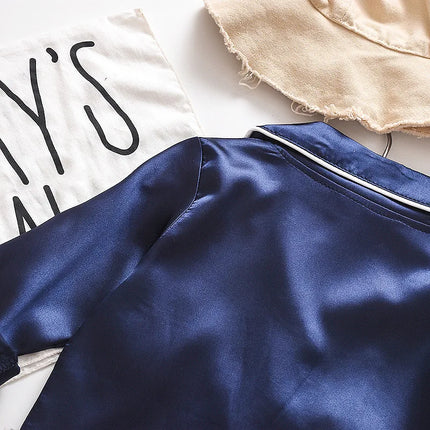 Korean version of childrens pajamas set silk satin long sleeve top+trousers two -piece male baby girl cartoon solid color set