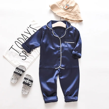 Korean version of childrens pajamas set silk satin long sleeve top+trousers two -piece male baby girl cartoon solid color set